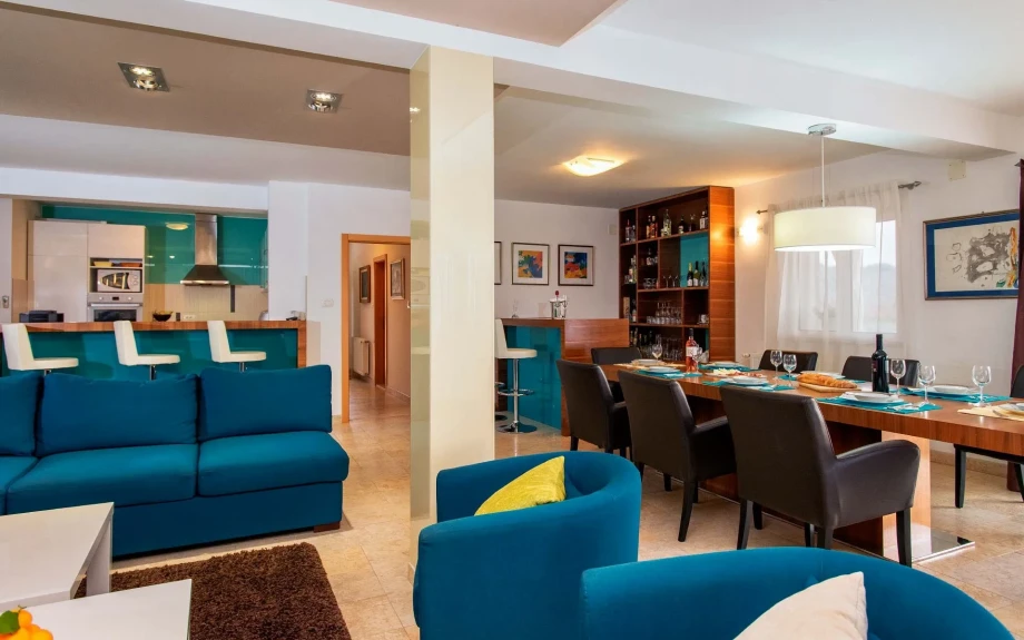 Large living room, dining room, kitchen and bar area