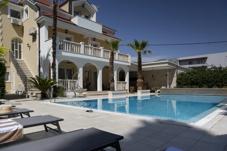 Large villa featuring a swimming pool and patio, set in beautiful Split, Kastela, Croatia. A perfect retreat for travelers.