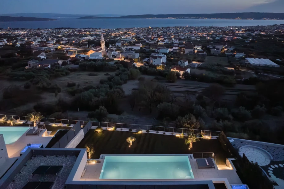 Stunning rooftop view of a luxury villas in Croatia, showing the vibrant coastline and picturesque cityscape.